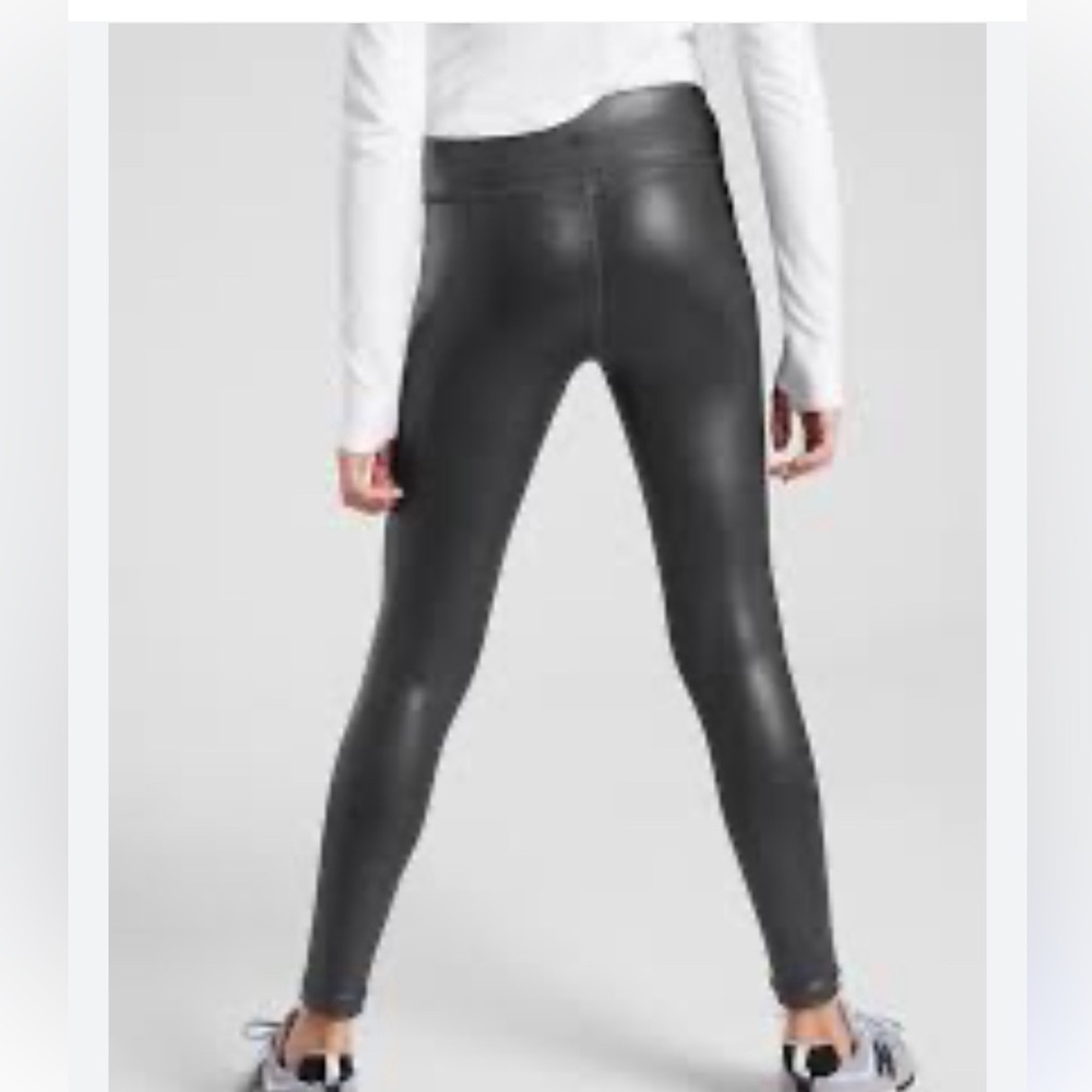 EUC- Athleta Girls- L/12. Black Powervita Shine Tight. Shiny legging w/